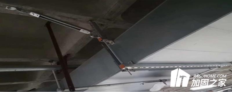 房屋大梁施加預應力加固法