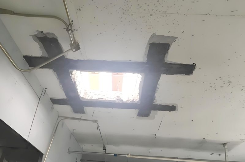 現(xiàn)澆樓板開洞粘接碳布加固